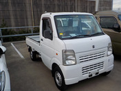 It is a picture of the white suzuki carry truck in 2012,First Photo Stock No.Y048842