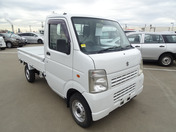 It is a picture of the white suzuki carry truck in 2010,First Photo Stock No.Y048848