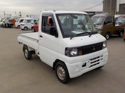 It is a picture of the white mitsubishi minicab truck in 2008,First Photo Stock No.Y048881